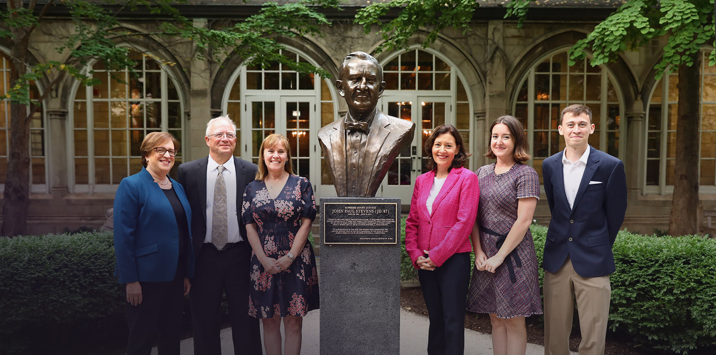Justice Kagan with Family Members of Justice John Paul Stevens in the Law School Courtyard